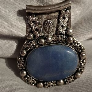 Handmade silver pendant with large blue stone